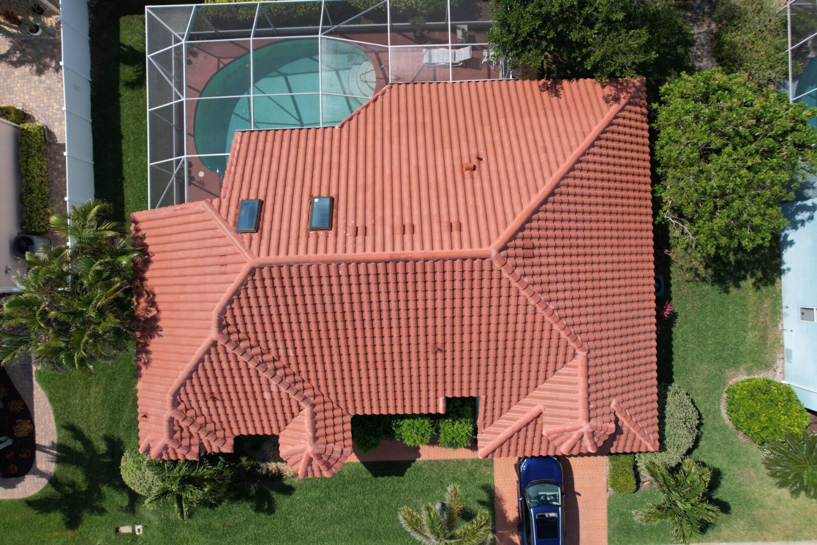 overhead view of a home with a red tile roof