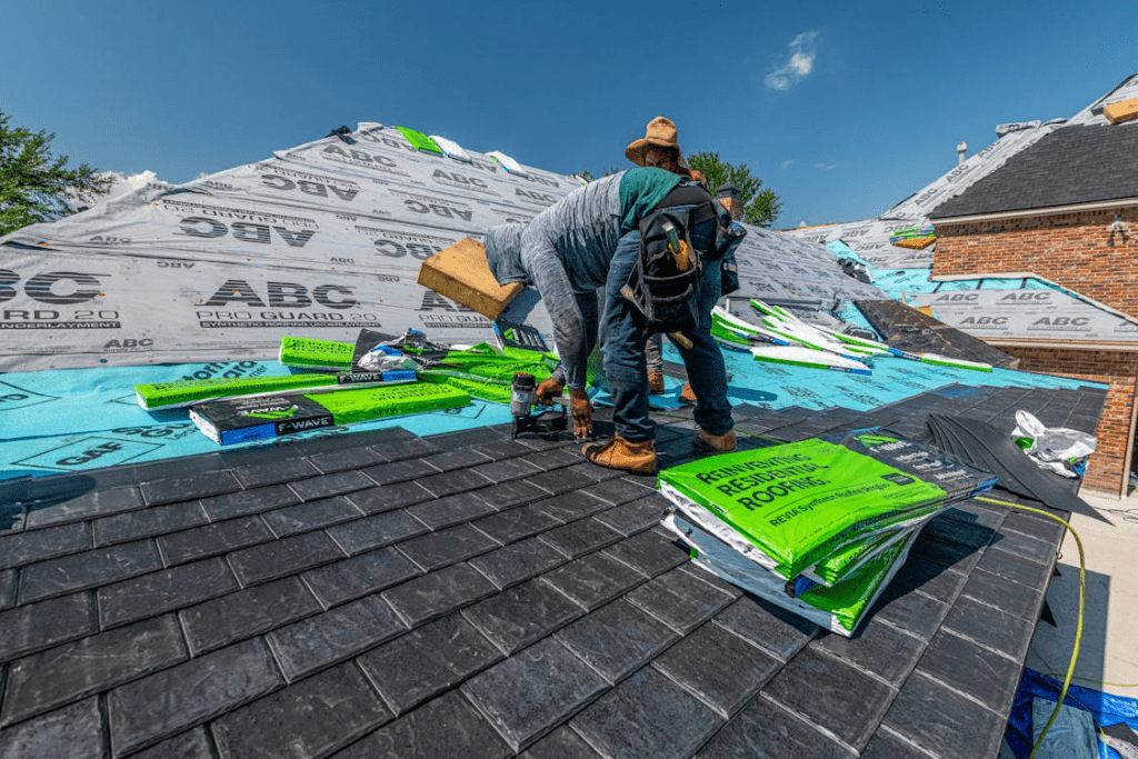 Professional roofer inspecting a Florida home roof for UV damage
